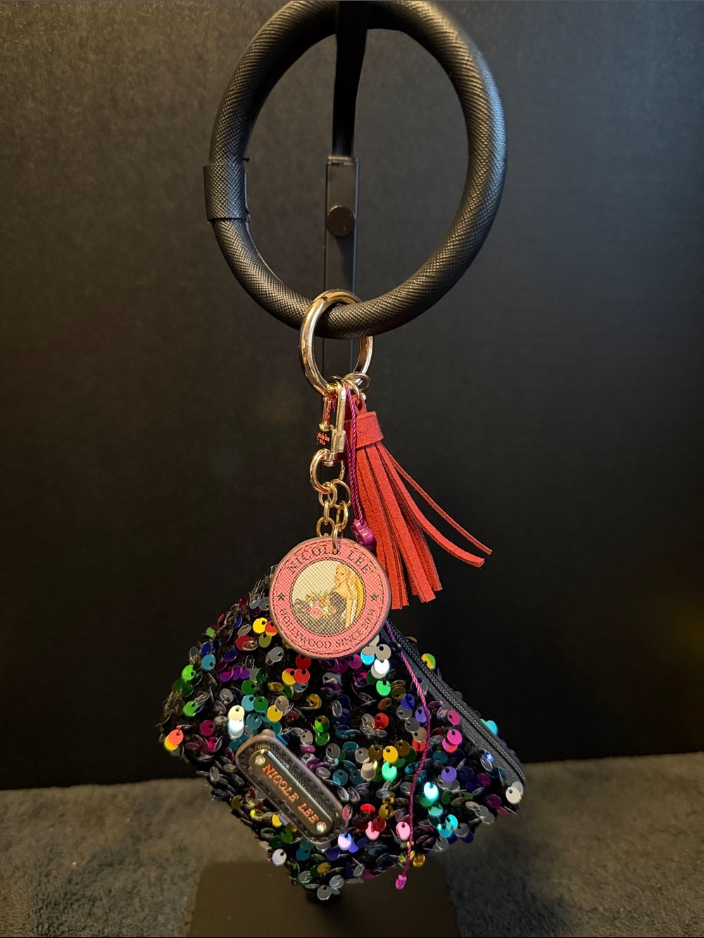 Nicole Lee Multicolor Sequin Wristlet with Pink Logo Charm